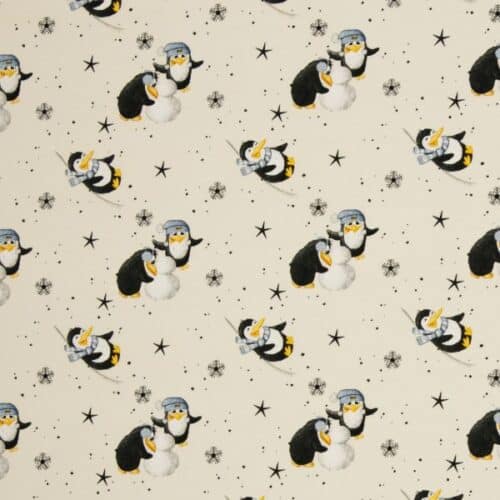 French terry med pingviner og snefnug på lys bund