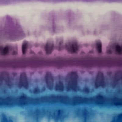 Batikagtigt mønster i lilla og blå på bomuldsjersey