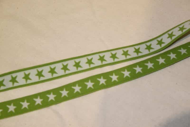 Hvide eller limegrønne stjerner 20 mm elastik