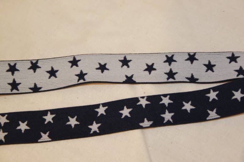 Hvid eller marineblå stjerner 25 mm elastik