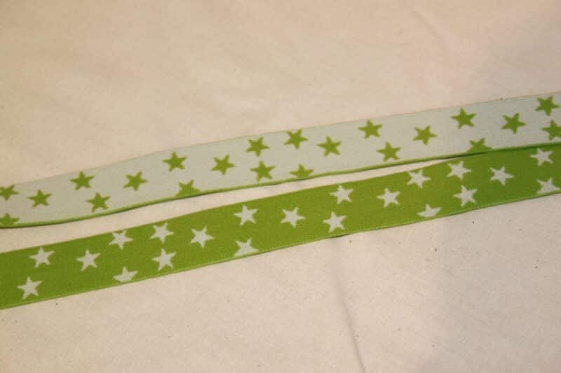 Hvid eller limegrønne stjerner 25 mm elastik