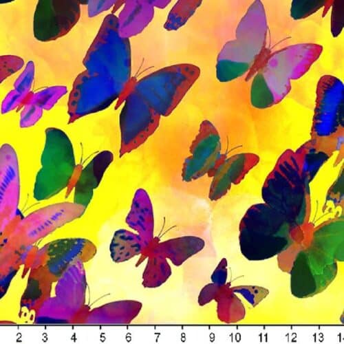 ﻿Farverige sommerfugle på gul bomuldsjersey